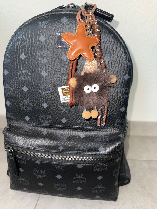 Wollmützchenpuschel